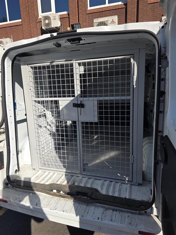 Van Vault cage rear doors open
